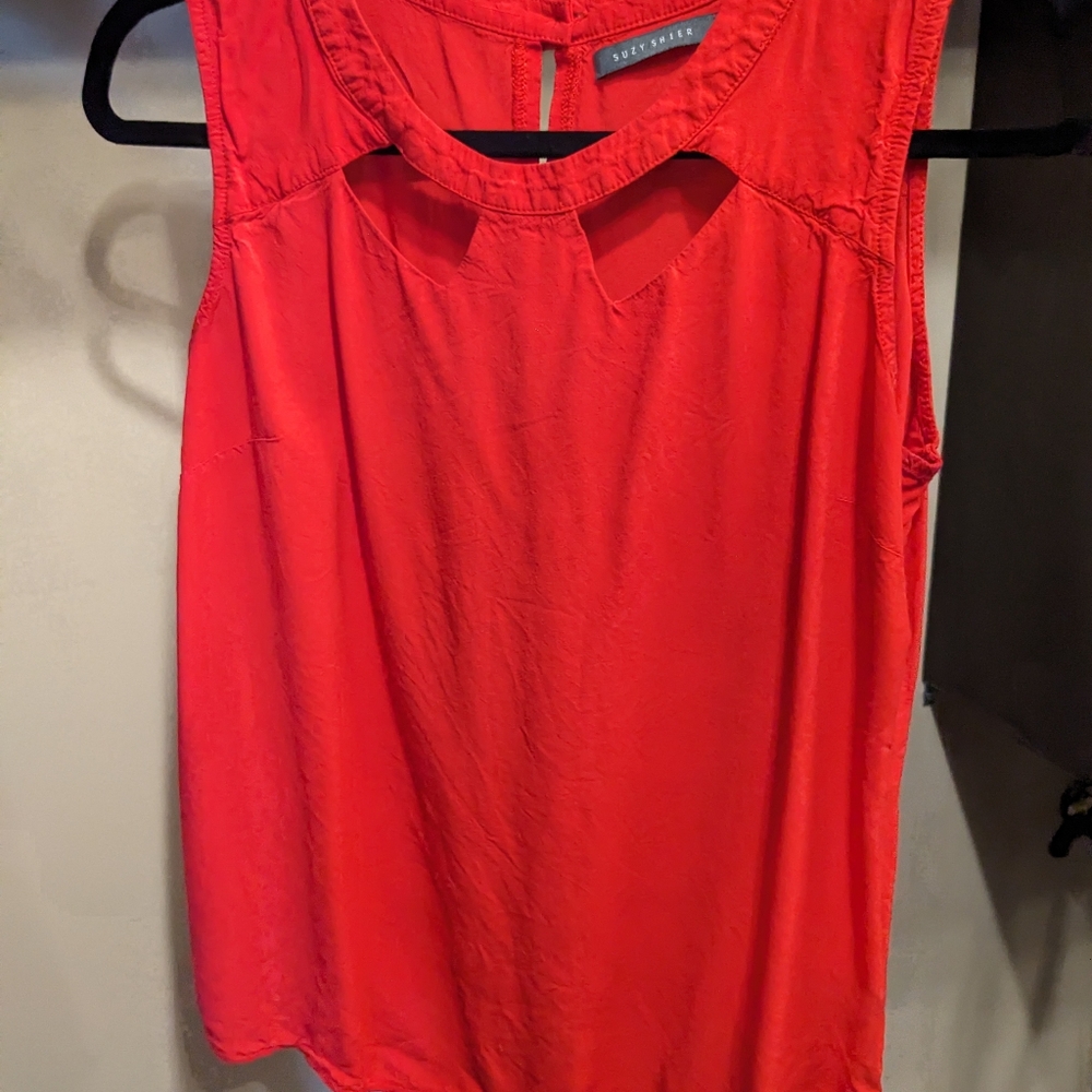 Red sleeveless shirt